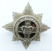 British Army 4th/7th Dragoon Guards officer's white metal cap badge, Gaunt makers to reverse
