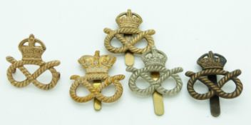 Five British Army Staffordshire Yeomanry metal cap badges, one example by Gaunt