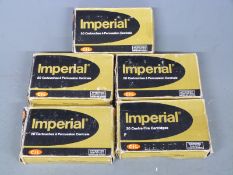 Twenty-six Imperial 6.5mm Mannlicher Schoenauer rifle cartridges together with a collection of empty