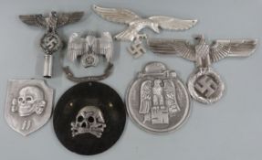 Quantity of replica Nazi German and other insignia including cast aluminium examples, Luftwaffe etc