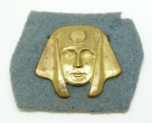 British Army WWI interpreter's brass arm badge