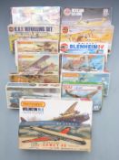 Fourteen Matchbox and Airfix plastic model kits including 1:700 scale ships, 1:72 scale aeroplanes