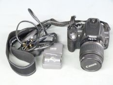 Canon EOS 350D digital SLR camera with Canon 18-55mm 1:3.5-5.6 lens and battery charger