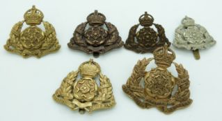 Six British Army Derbyshire Yeomanry metal cap badges including an Imperial Yeomanry example, one by