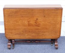 19thC mahogany Sutherland table raised on turned supports with brass castors, W92 max L122 x H73