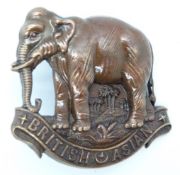 British Army King's Colonials British Asia metal hat badge