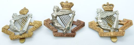 Three British Army 8th King's Own Royal Irish Hussars metal cap badges including Victorian example