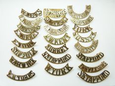 British Army small collection of Infantry County Regiments metal shoulder titles including