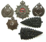 Six New Zealand Army Staff/Permanent Staff Corps metal cap and collar badges