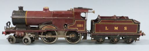 Hornby 0 gauge clockwork LMS 4-4-0 tender locomotive 1185, in maroon livery.