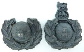 Two Royal Marines economy plastic badges, one with A Stanley & Sons Walsall to reverse