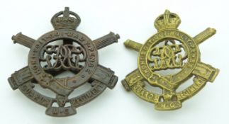 British Army Guards Machine Gun Regiment officer's bronze cap badge together with a cast brass
