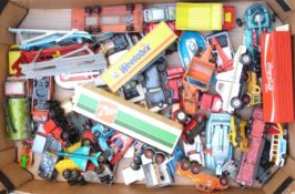 Over 50 Corgi, Dinky, Matchbox, Budgie and similar diecast model vehicles.