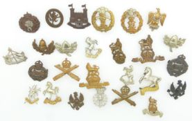 Small collection of British Army metal badges including West Somerset Yeomanry, Royal West Kent,