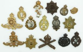 Fifteen British Army Royal Artillery, REME, Army Service Corps badges including two economy