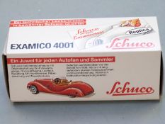 Schuco Examico 4001 diecast model car, in original box with paperwork.
