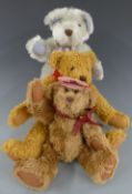 Three various Teddy bears one by Metro, one Millennium bear and one with a musical box, largest 44cm