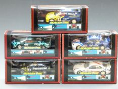 Five Hornby Scalextric model motor racing cars comprising Ford Escort Cosworth Panasonic C.204, Ford