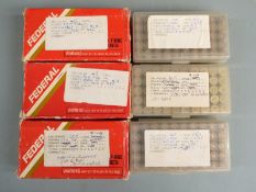 Two-hundred-and-thirty-four .45 Colt rifle cartridges together with 66 empty brass cases, some in