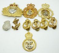 Ten Royal Navy metal badges including a small white metal mine sweeper example