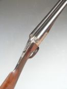 Holland and Holland 12 bore side by side shotgun with named and border engraved lock, thumb lever,