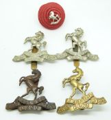 Five British Army Royal West Kent Regiment metal cap badges including an officer's BOSS example