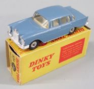 Dinky Toys diecast model Mercedes Benz 220 SE with blue body, cream interior and silver hubs, 186,