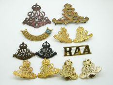 Twelve Australian Army Royal Australian Artillery hat and collar badges including three pairs of