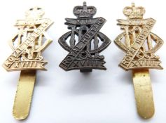 Three British Army 13th Hussars metal cap badges, one by Gaunt
