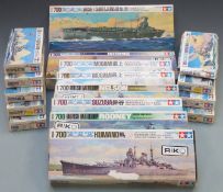 Sixteen Tamiya 1:700 scale plastic model kits including Shiratuyu, Ayanami and Rodney Battleship,
