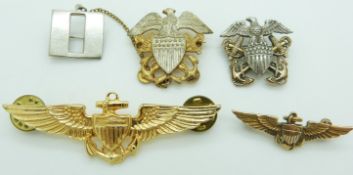 Five American military badges including Captain's bars, one gold plated the other silver gilt