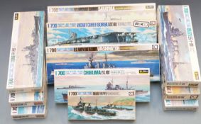 Eleven Japanese Fujimi/Aoshima 1:700 scale plastic model kits including Saratago, Isuzu and Chikuma,