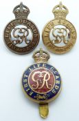 Three British Army Life Guards metal cap badges including an enamelled example