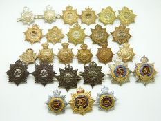Twenty Six British Army metal collar badges for the Army Service Corps/Royal Army Service Corps in