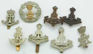 Eight British Army Green Howards / The Yorkshire Regiment metal cap badges including a Victorian