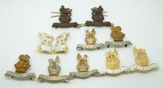 Eleven British Army 15th and 15th/19th Hussars metal collar badges in five pairs including an OSD