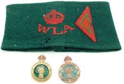 Women's Land Army arm band together with two enamelled badges