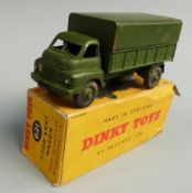 Dinky Toys diecast model 3-ton Army Wagon with green body, cover and hubs, 621, in original box.