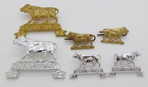 Six Kenya Regiment Territorial Force metal/anodised cap and collar badges in two sets