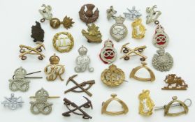 Small collection of British Army collar badges including West Kent Yeomanry, Hampshire Regiment,