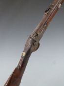 Percussion hammer action rifle with engraved lock, stylised dolphin hammer, top plate and