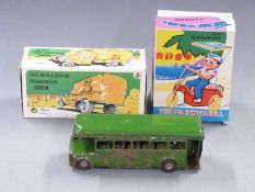 Thee tinplate toys comprising Tri-ang Minic clockwork London Transport bus, Kovap Auto Pokladnicka