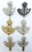 Six British Army Durham Light Infantry metal hat badges