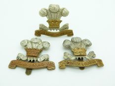 Three British Army Welsh Yeomanry metal cap badges