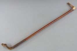 A riding crop with white metal mount, maker Armstrong & Co, Carlisle, L73cm