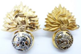 British Army Northumberland Fusiliers officer's gilt cap badge together with a bi-metal example