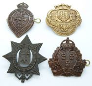 Four British Army Caernarvonshire, Middlesex, Lancashire and Cheshire Volunteer Regiment metal cap