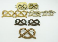 Nine British Army South Staffordshire Regiment metal collar badges in four pairs plus one