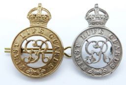 Two British Army First Life Guards metal cap badges, one marked silver to reverse