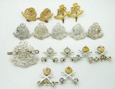 Sixteen British Army support arms metal collar badges for the Military Police and Physical